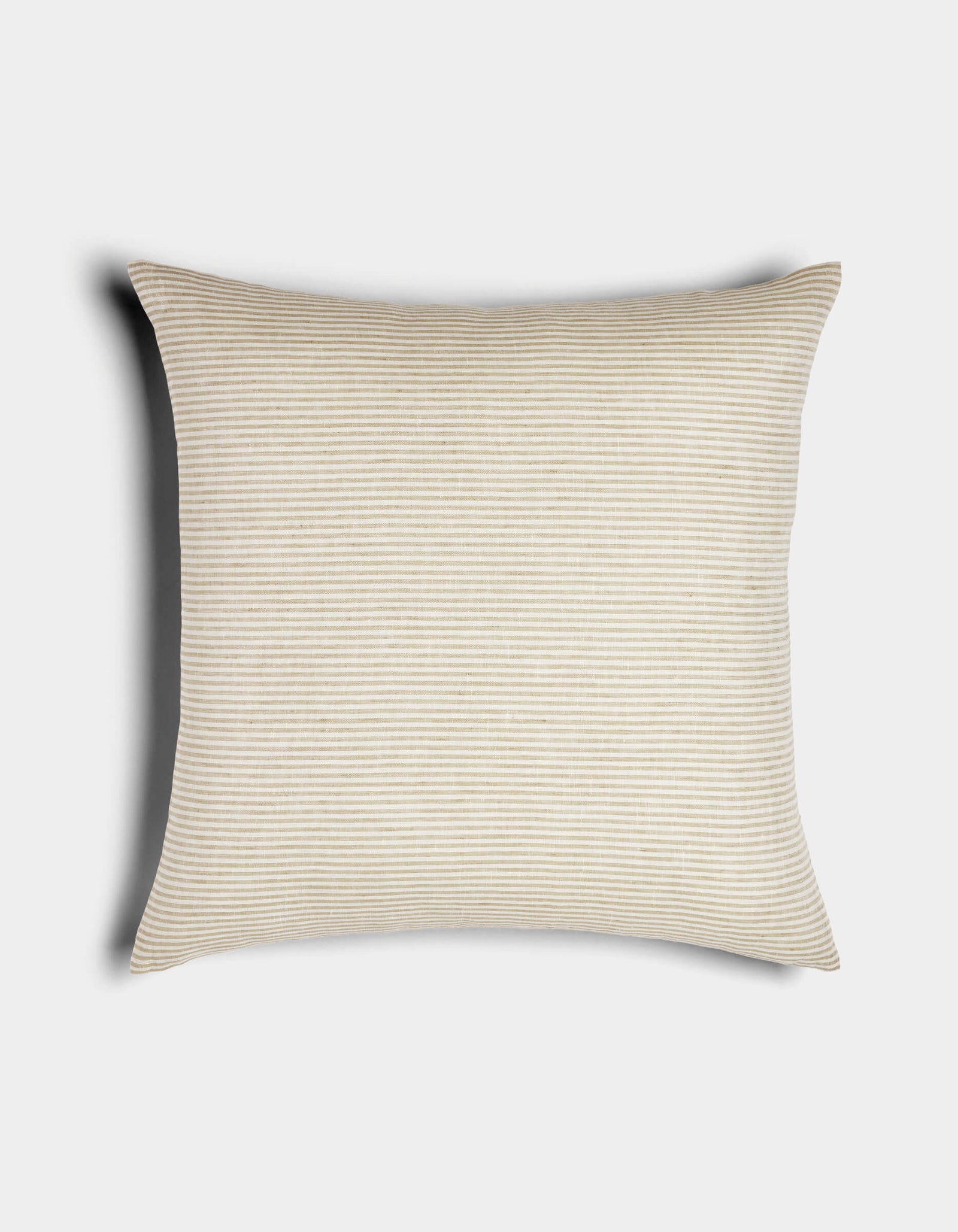 The Cozy Earth Striped Throw Pillow features light beige and white thin horizontal stripes on a rectangular design, displayed against a white background with a soft shadow cast to the left.