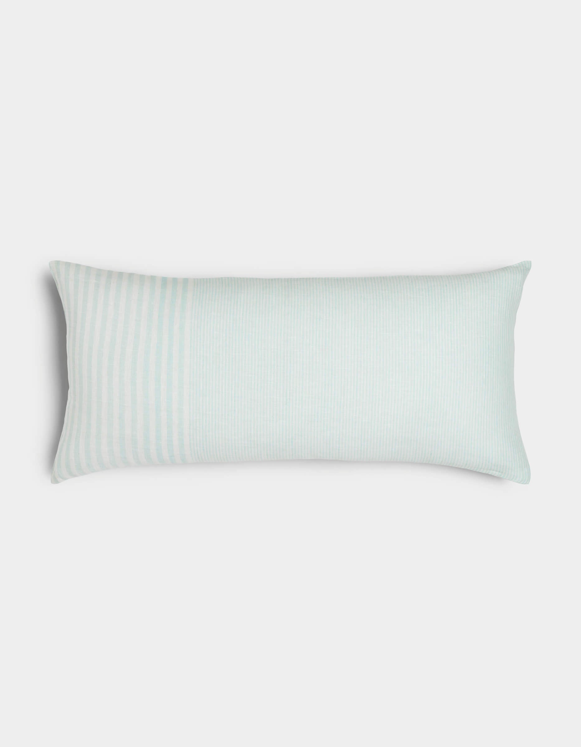 The Cozy Earth Striped Throw Pillow features pale blue and white vertical pinstripes, with a left section of thicker stripes, displayed against a plain white background.|Color:Mixed Stripe Tide and Sea Salt |Size:14" x 30"