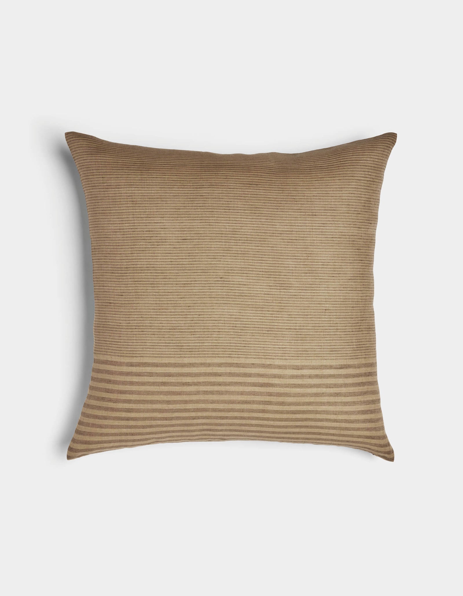 The Cozy Earth Striped Throw Pillow is rectangular and beige, featuring a subtle ribbed texture with horizontal stripes along the bottom edge, displayed on a plain white background.