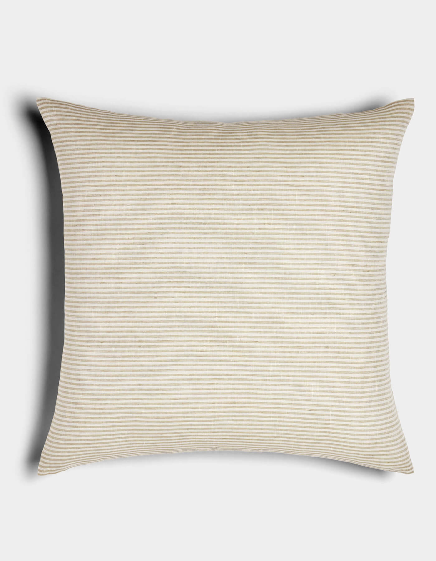 The Cozy Earth Striped Throw Pillow features a beige and white thin horizontal stripe pattern, displayed against a plain white background with a shadow that suggests it is slightly elevated from the surface.