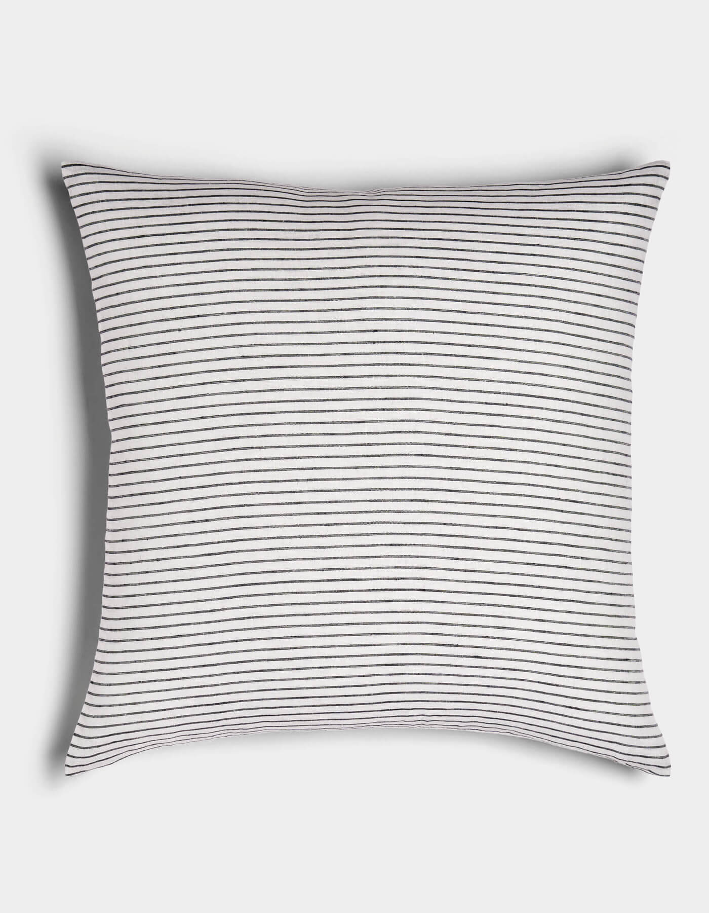 The Cozy Earth Striped Throw Pillow features a white background with thin, evenly spaced horizontal black stripes, displayed on a plain white surface.