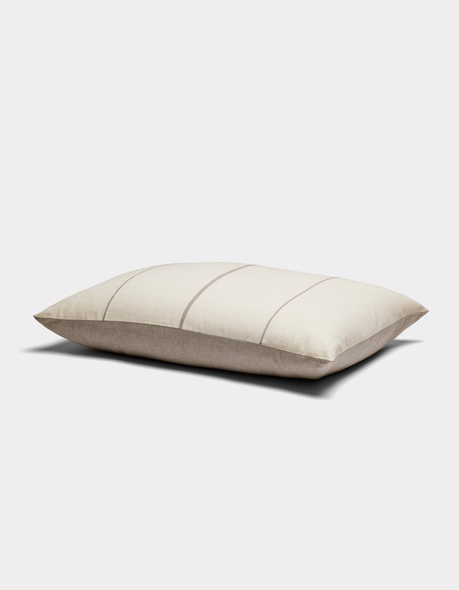 The Cozy Earth Baja Double Sided Sham is a rectangular beige pillow featuring thin, light gray horizontal stripes, shown on a white background.