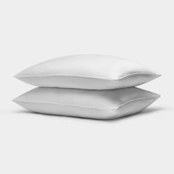 A stack of two Cozy Earth Down Alternative Pillows on a white background
Standard King