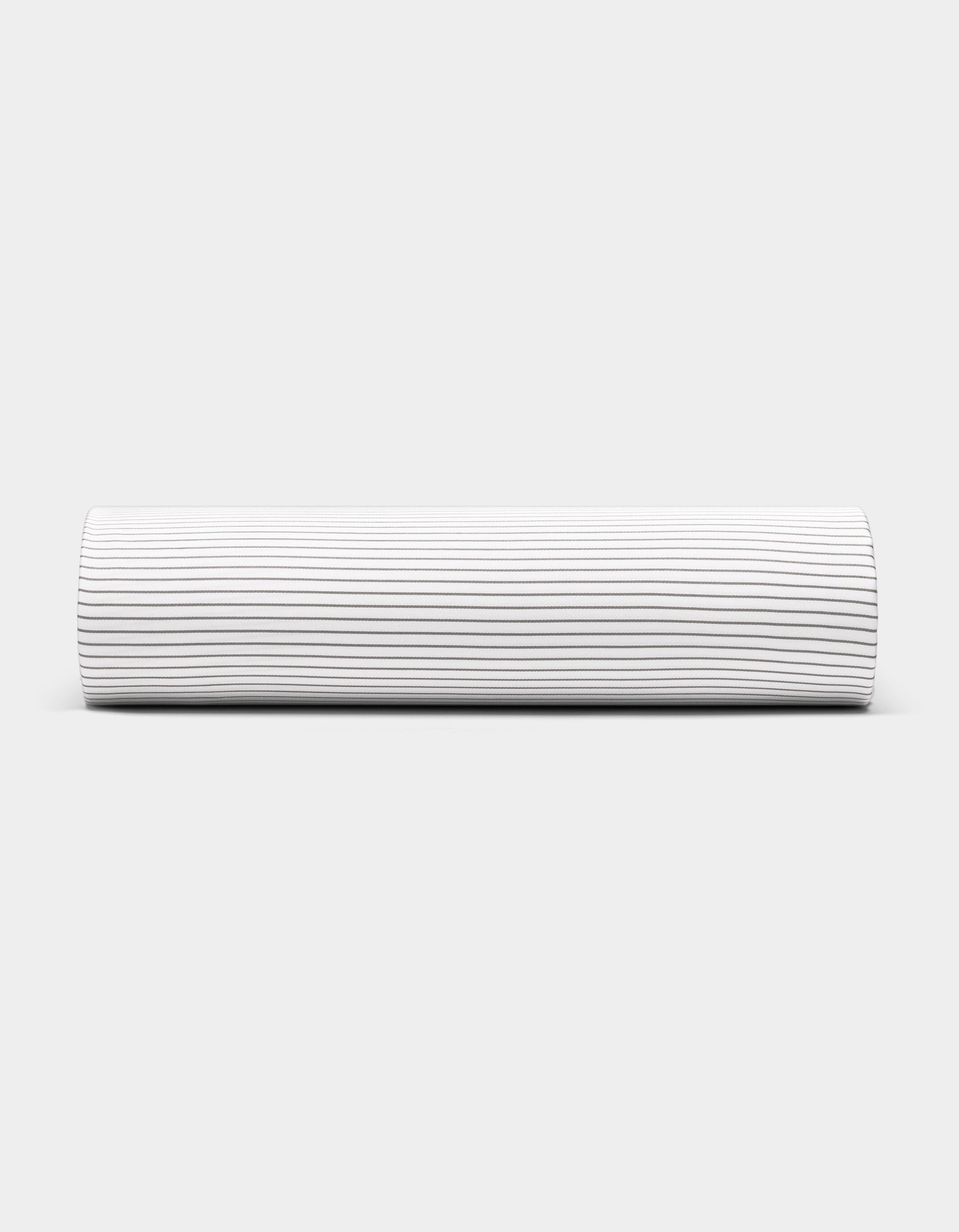 The Bamboo Fitted Sheet by Cozy Earth is displayed against a plain light gray surface, featuring thin, evenly spaced horizontal black stripes on a white background.|Color:Driftwood Pinstripe