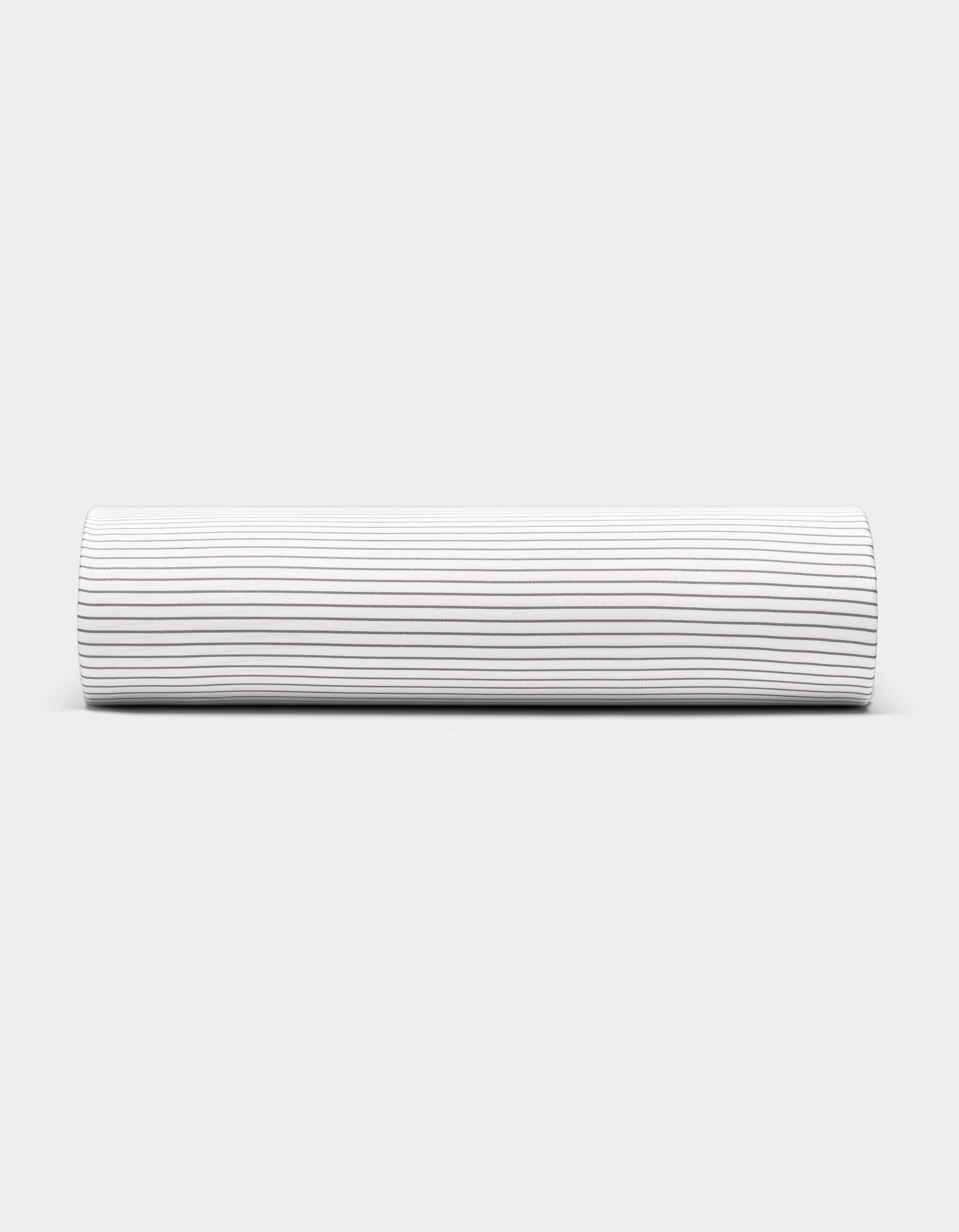 The Bamboo Fitted Sheet by Cozy Earth is displayed against a plain light gray surface, featuring thin, evenly spaced horizontal black stripes on a white background.