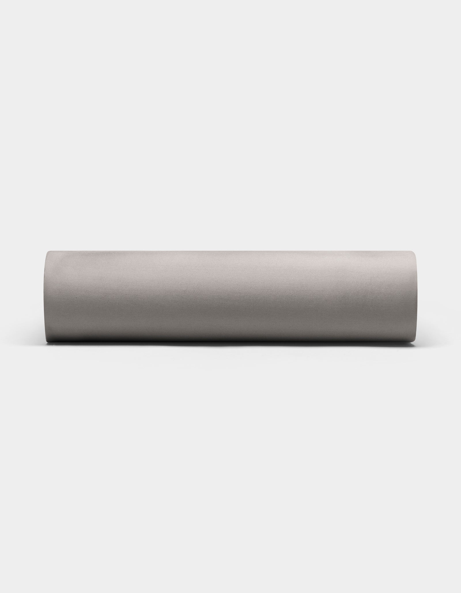 A Bamboo Fitted Sheet by Cozy Earth is displayed horizontally against a plain white background.