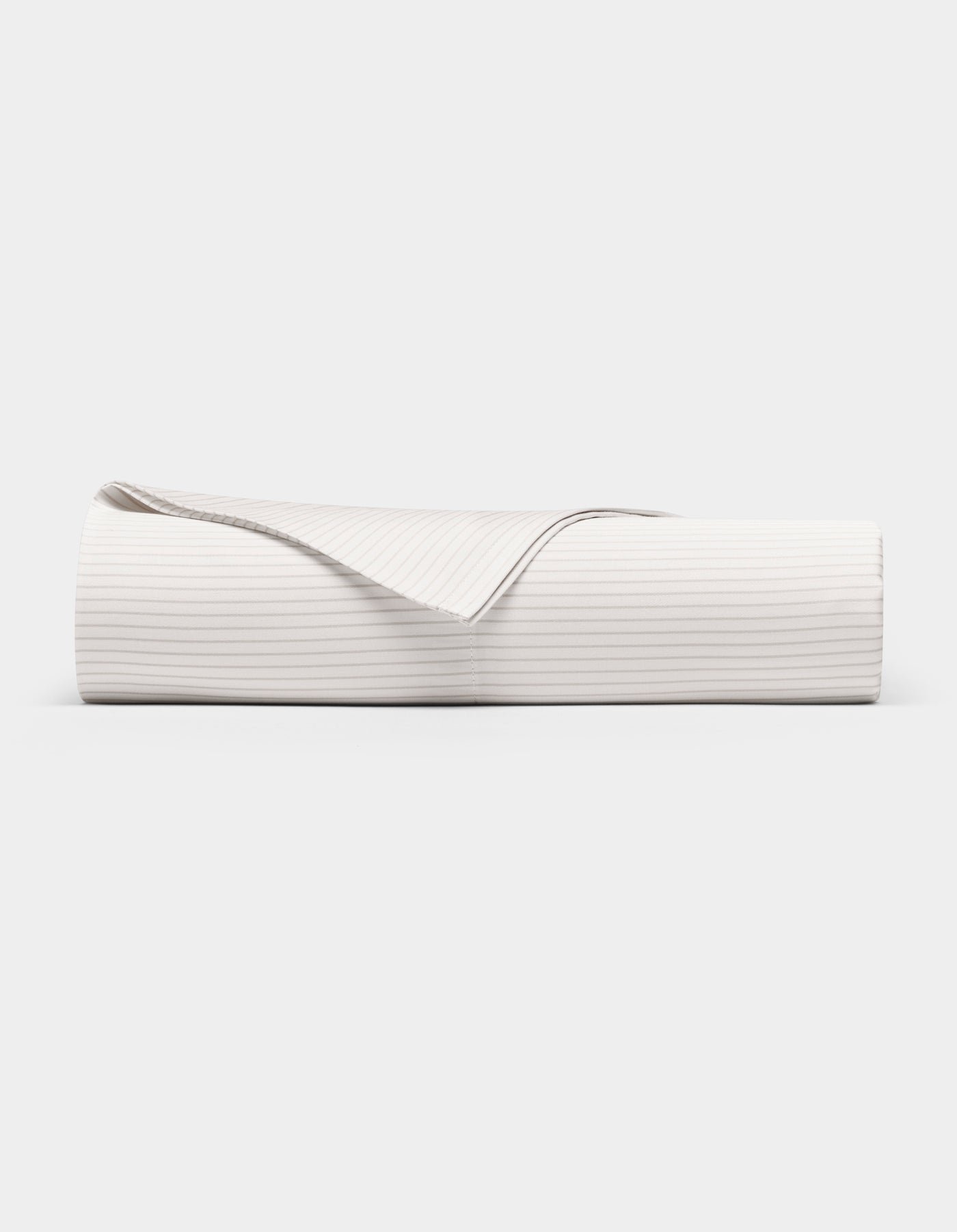The Cozy Earth Bamboo Flat Sheet, shown neatly folded with one corner turned over to reveal the underside, features subtle horizontal stripes and is displayed against a plain white background.|Color:Driftwood Pinstripe