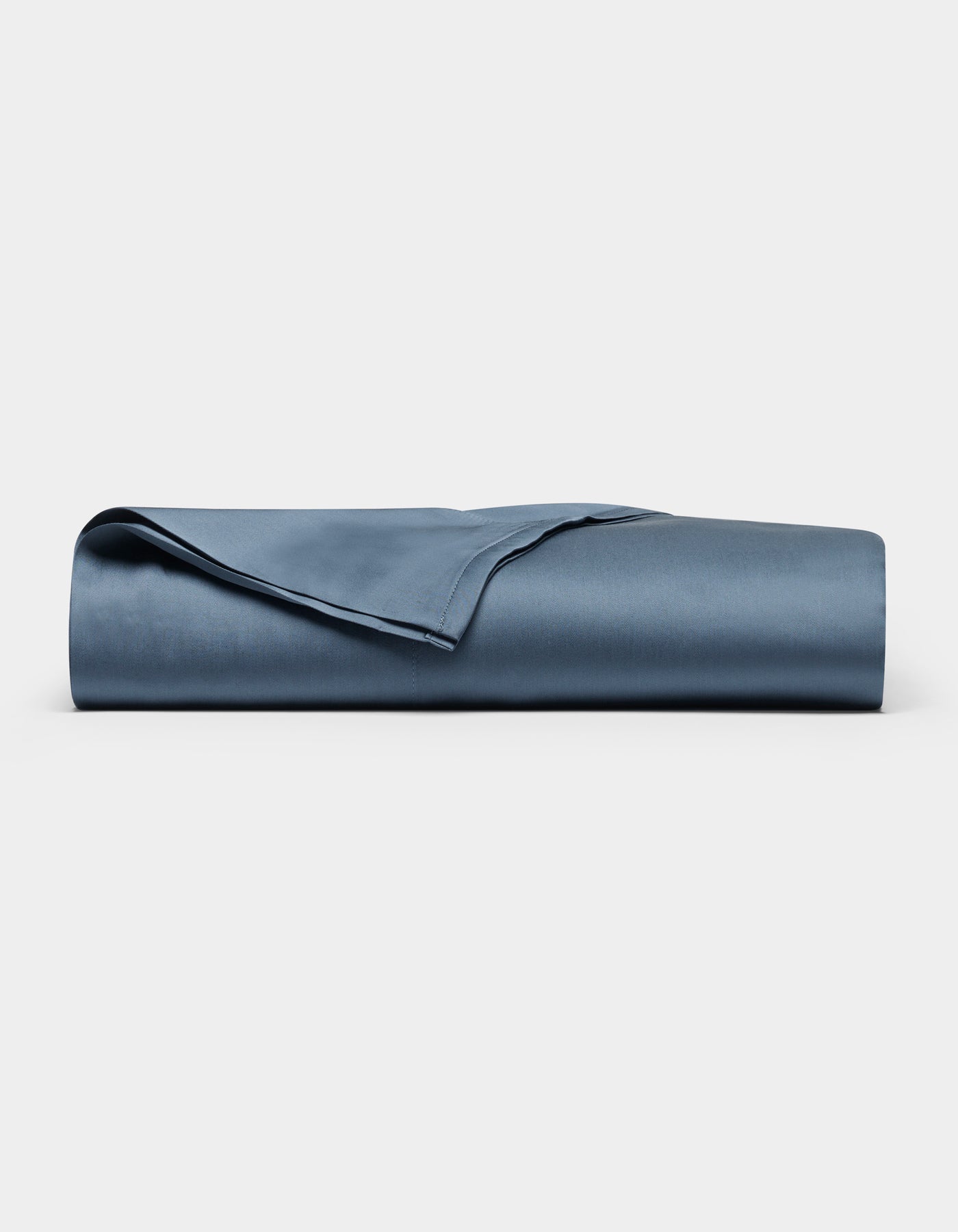 A neatly folded Cozy Earth Bamboo Flat Sheet is displayed against a plain white background.