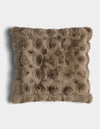 The Bubble Cuddle Pillow by Cozy Earth is a square, brown faux fur pillow with a textured, tufted surface, shown against a white background.|Color:Walnut