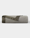 The Cozy Earth Bamboo Blanket, shown neatly folded with an olive green satin trim, is featured against a plain white background. |Color:Sage/Olive