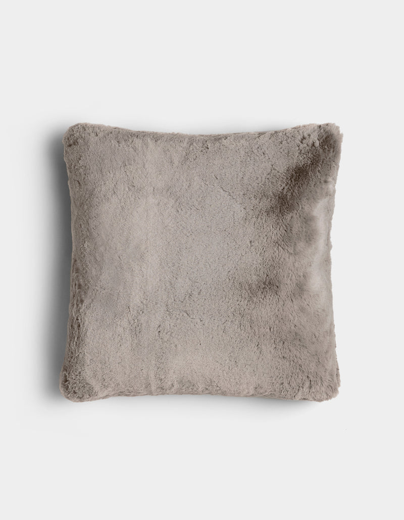 The Cuddle Pillow by Cozy Earth is a square, light gray plush pillow with a soft, fuzzy texture, displayed on a plain white background.