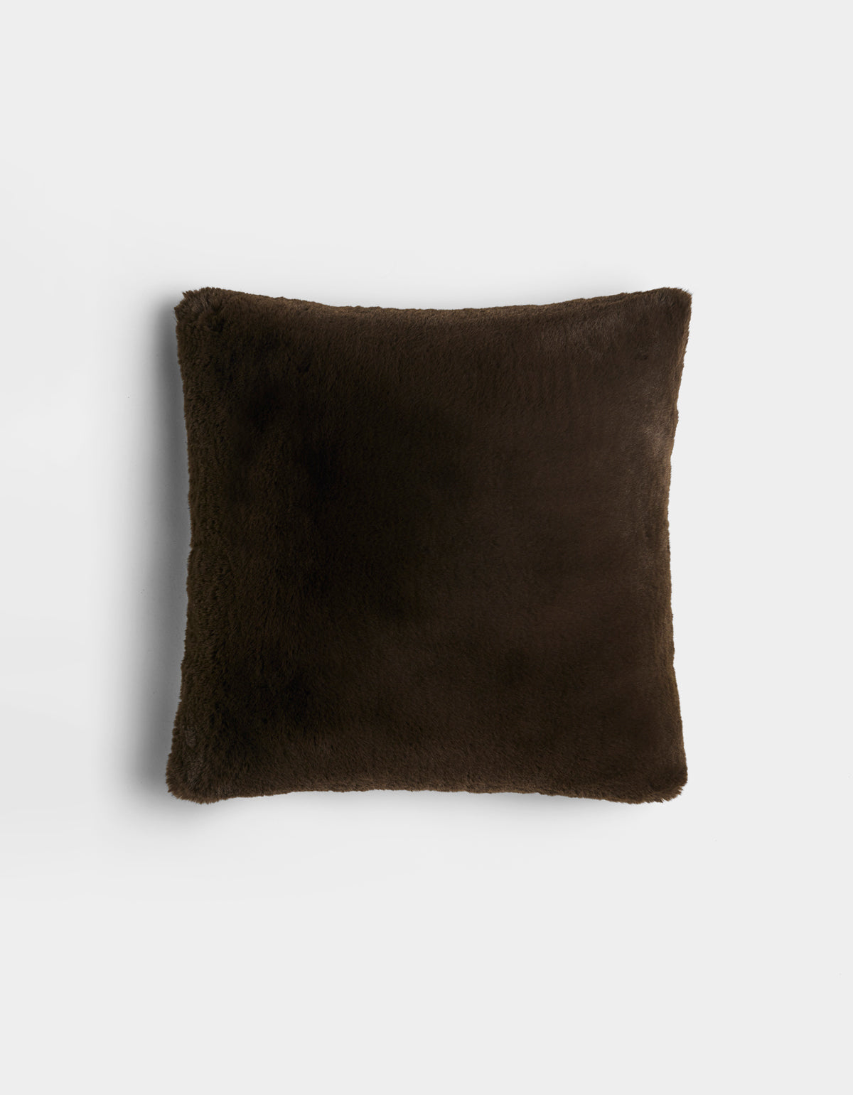 The Cozy Earth Cuddle Pillow is a square, dark brown plush pillow with a soft, fuzzy texture, displayed against a plain white background.|Color:Espresso |Size:20" x 20"