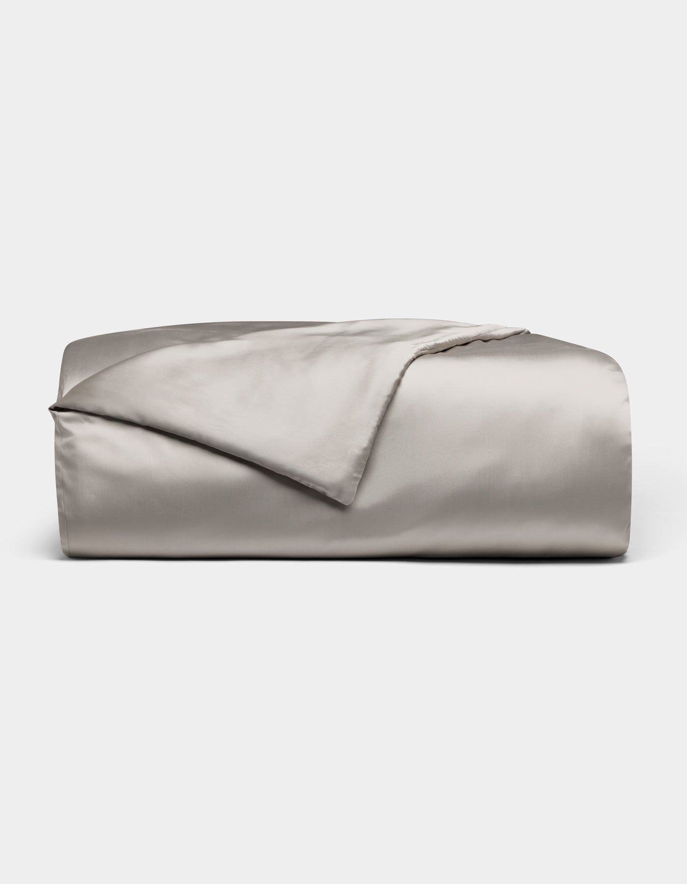 The Cozy Earth Bamboo Duvet Cover, shown neatly folded in light gray with a smooth, shiny satin finish, is displayed on a plain white background.