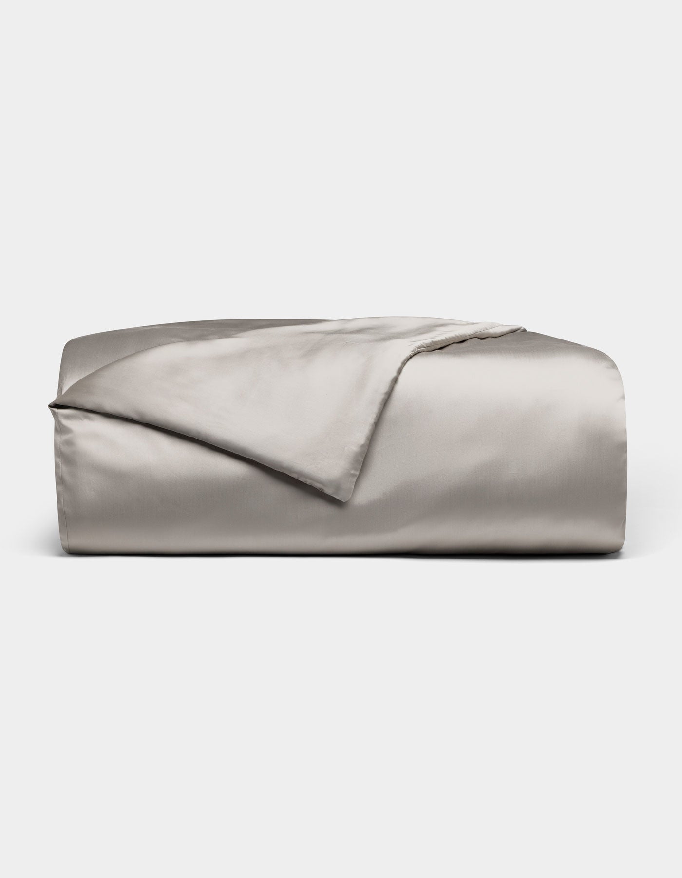 The Cozy Earth Bamboo Duvet Cover, shown neatly folded in light gray with a smooth, shiny satin finish, is displayed on a plain white background.