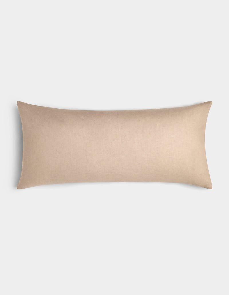 The Cozy Earth Linen Throw Pillow, rectangular and beige with a smooth fabric cover, is displayed against a plain white background.