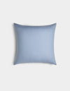 The Cozy Earth Linen Throw Pillow is rectangular, light blue, and features a smooth, plain surface, displayed on a white background.|Color:Breeze |Size:20" x 20"