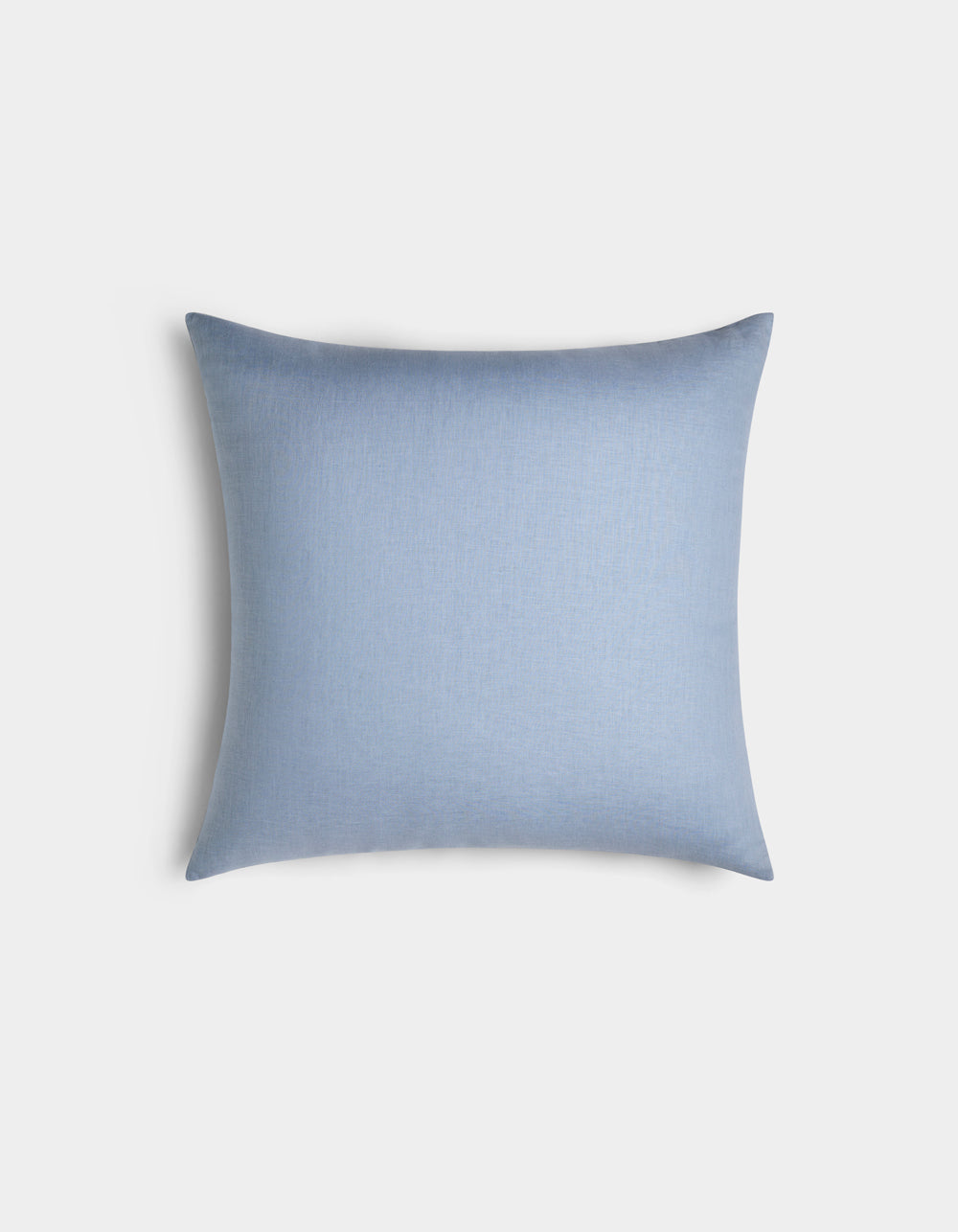 The Cozy Earth Linen Throw Pillow is rectangular, light blue, and features a smooth, plain surface, displayed on a white background.