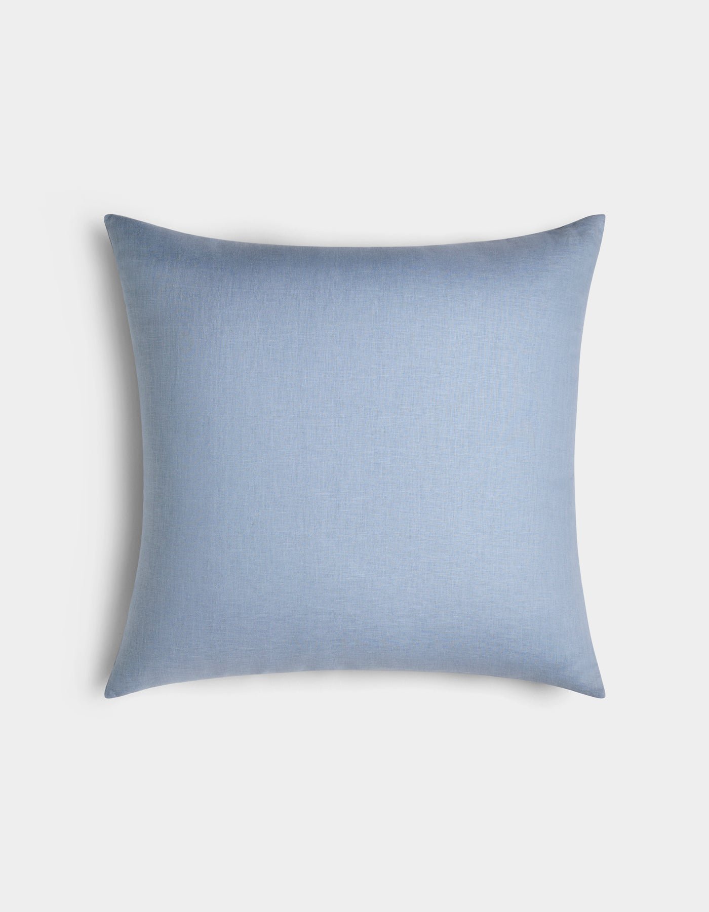The Cozy Earth Linen Throw Pillow, rectangular and light blue, is displayed against a plain white background.