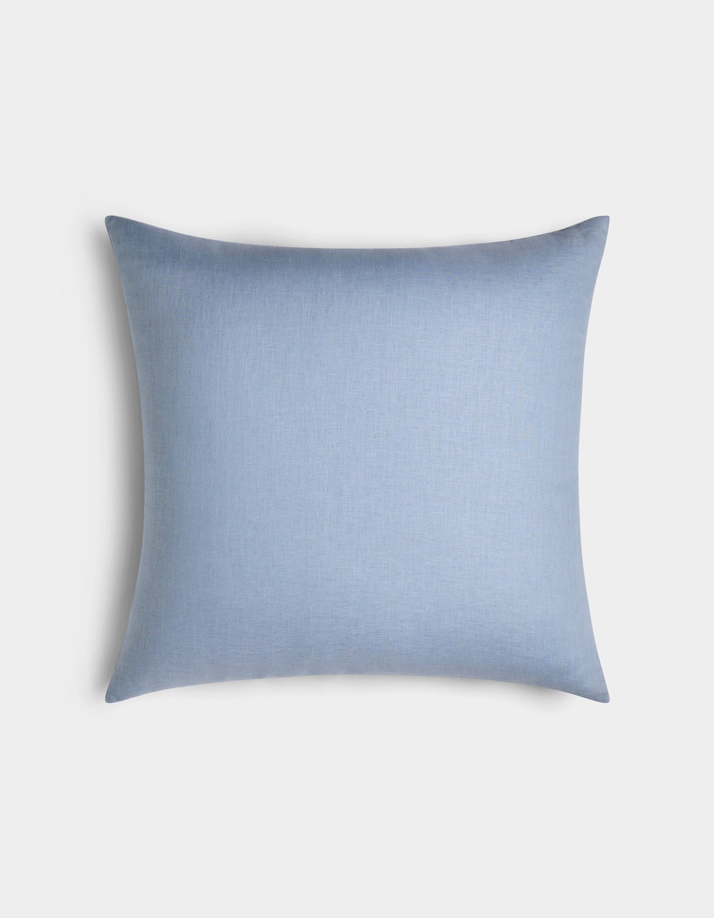 The Cozy Earth Linen Throw Pillow, rectangular and light blue, is displayed against a plain white background.