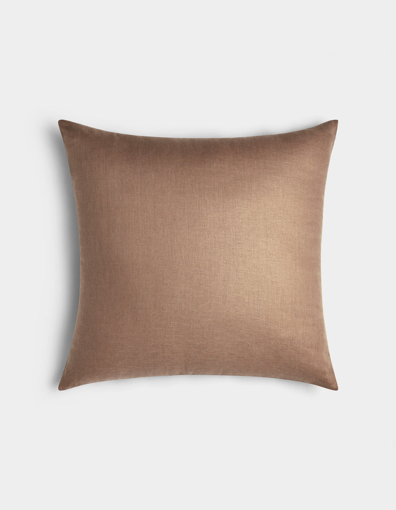 The Cozy Earth Linen Throw Pillow is square and light brown, featuring a smooth, plain fabric cover and shown against a white background.