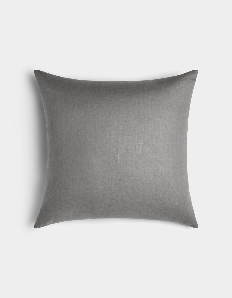 The Linen Throw Pillow by Cozy Earth is rectangular and gray, featuring a smooth, solid-colored fabric cover. It is displayed against a plain white background.