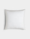 The Cozy Earth Linen Throw Pillow features smooth white fabric in a classic square shape, displayed against a light gray background.|Color:White