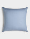 The Cozy Earth Linen Throw Pillow, rectangular and light blue with a smooth, plain fabric surface, is displayed against a white background.|Color:Breeze |Size:26" x 26"