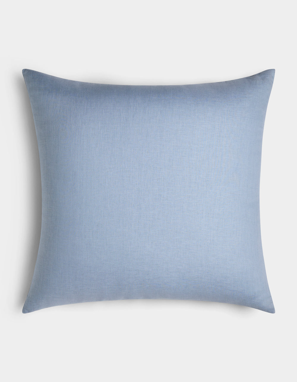 The Cozy Earth Linen Throw Pillow, rectangular and light blue with a smooth, plain fabric surface, is displayed against a white background.