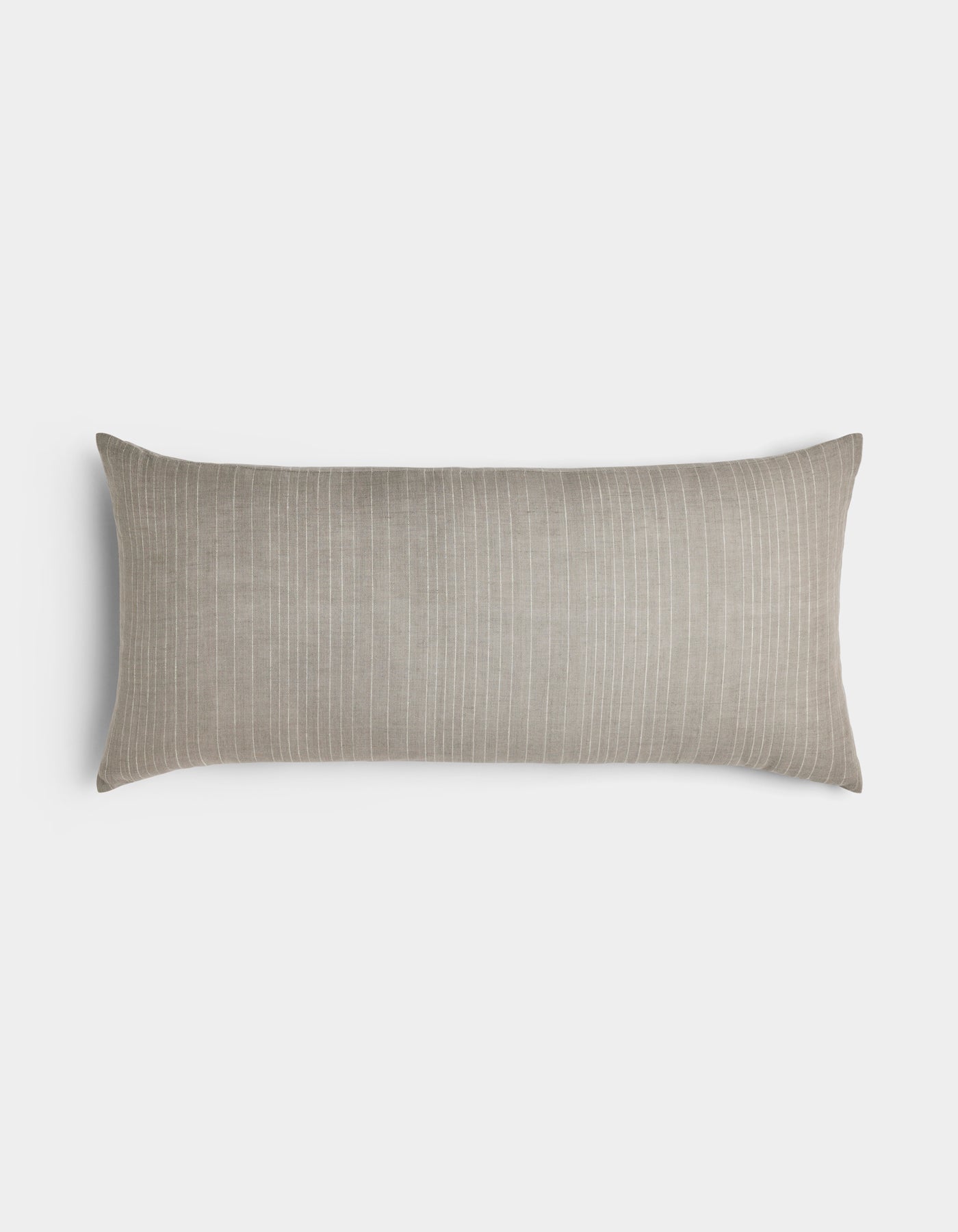 The Cozy Earth Striped Throw Pillow is a long rectangular beige accent with subtle white vertical pinstripes, shown on a plain light gray background.|Color:Grey|Size:14" x 30"