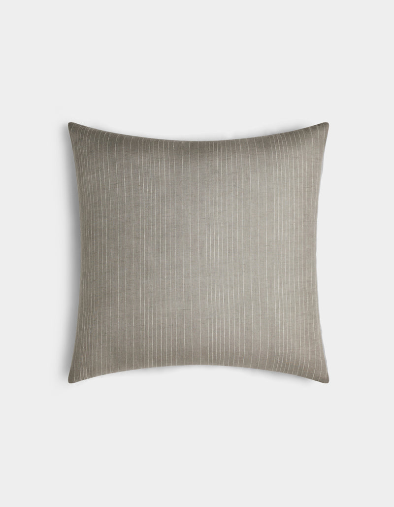 The Cozy Earth Striped Throw Pillow features a light gray fabric with thin vertical white pinstripes and is displayed against a plain white background.