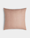 The Cozy Earth Striped Throw Pillow features a square shape in light brown with thin vertical white pinstripes, shown on a plain white background.|Color:Clay|Size:24" x 24"