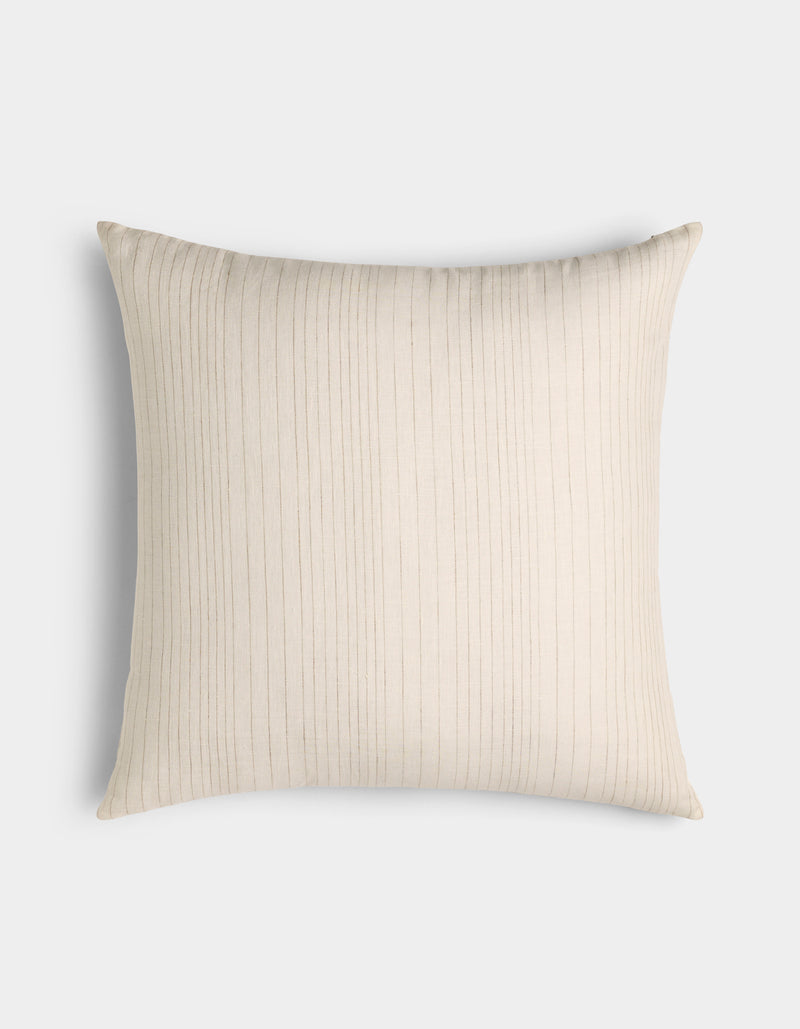 The Cozy Earth Striped Throw Pillow is a square, cream-colored accent with subtle vertical pinstripes, displayed against a white background.