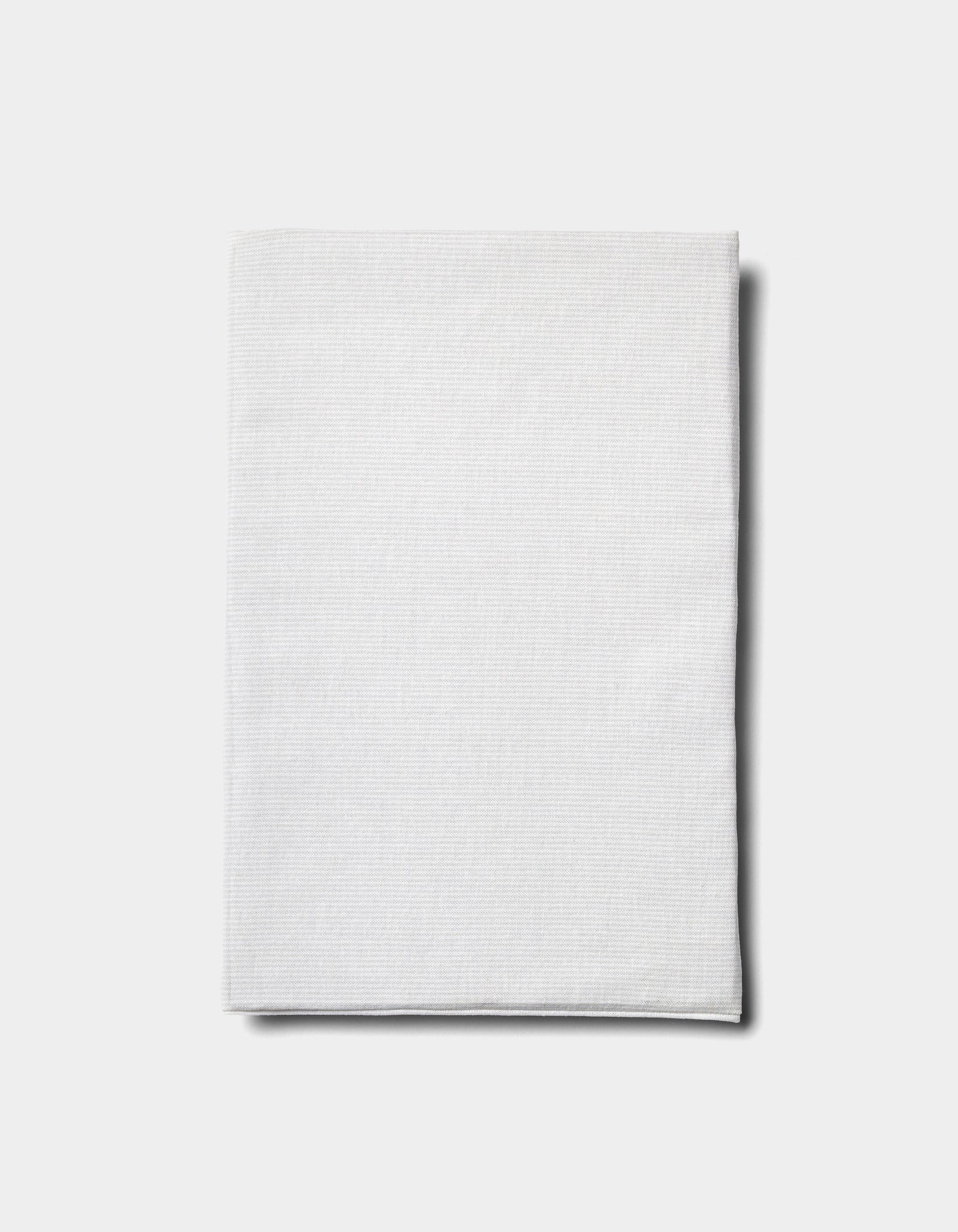 The Baja Double Sided Sham by Cozy Earth is neatly folded and displayed on a plain light gray background.