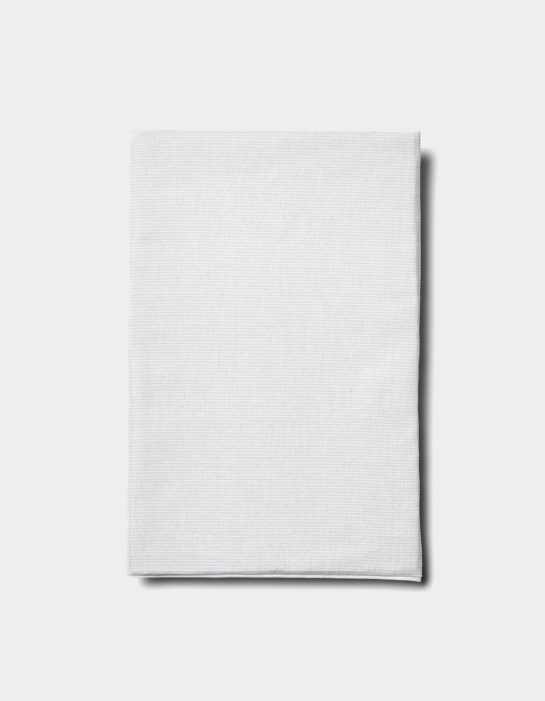 The Baja Double Sided Sham by Cozy Earth is neatly folded and displayed on a plain light gray background.
