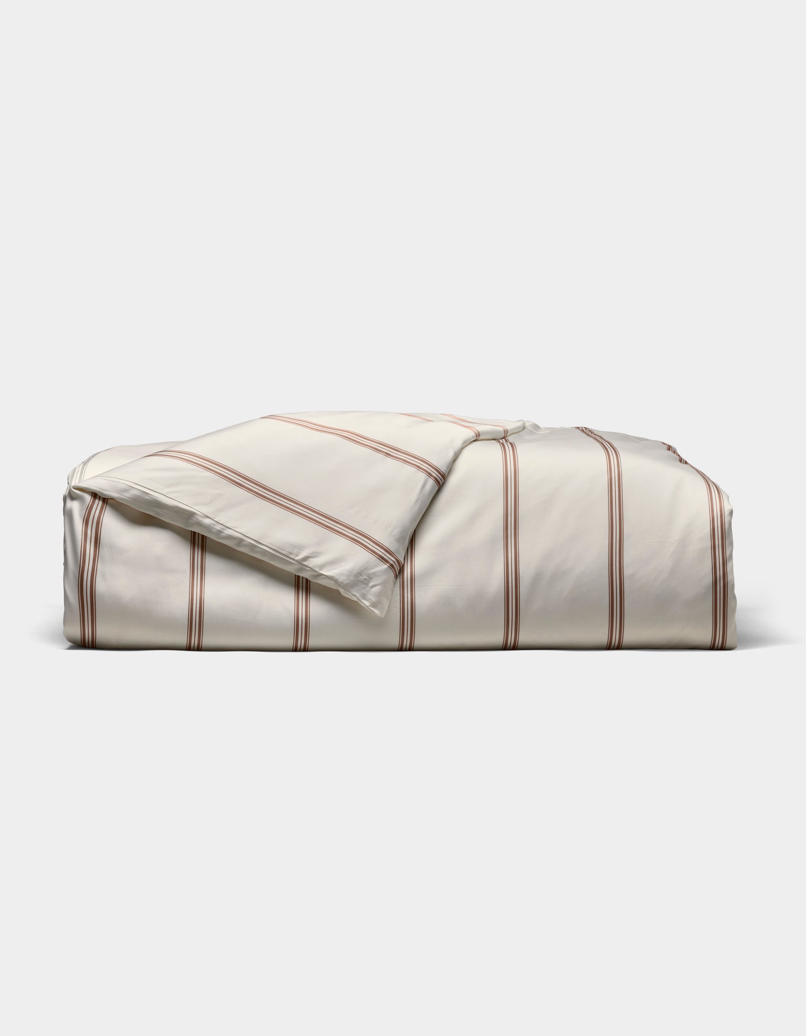 The Cozy Earth Bamboo Duvet Cover, in cream with thin red stripes, is shown neatly folded against a plain white background.