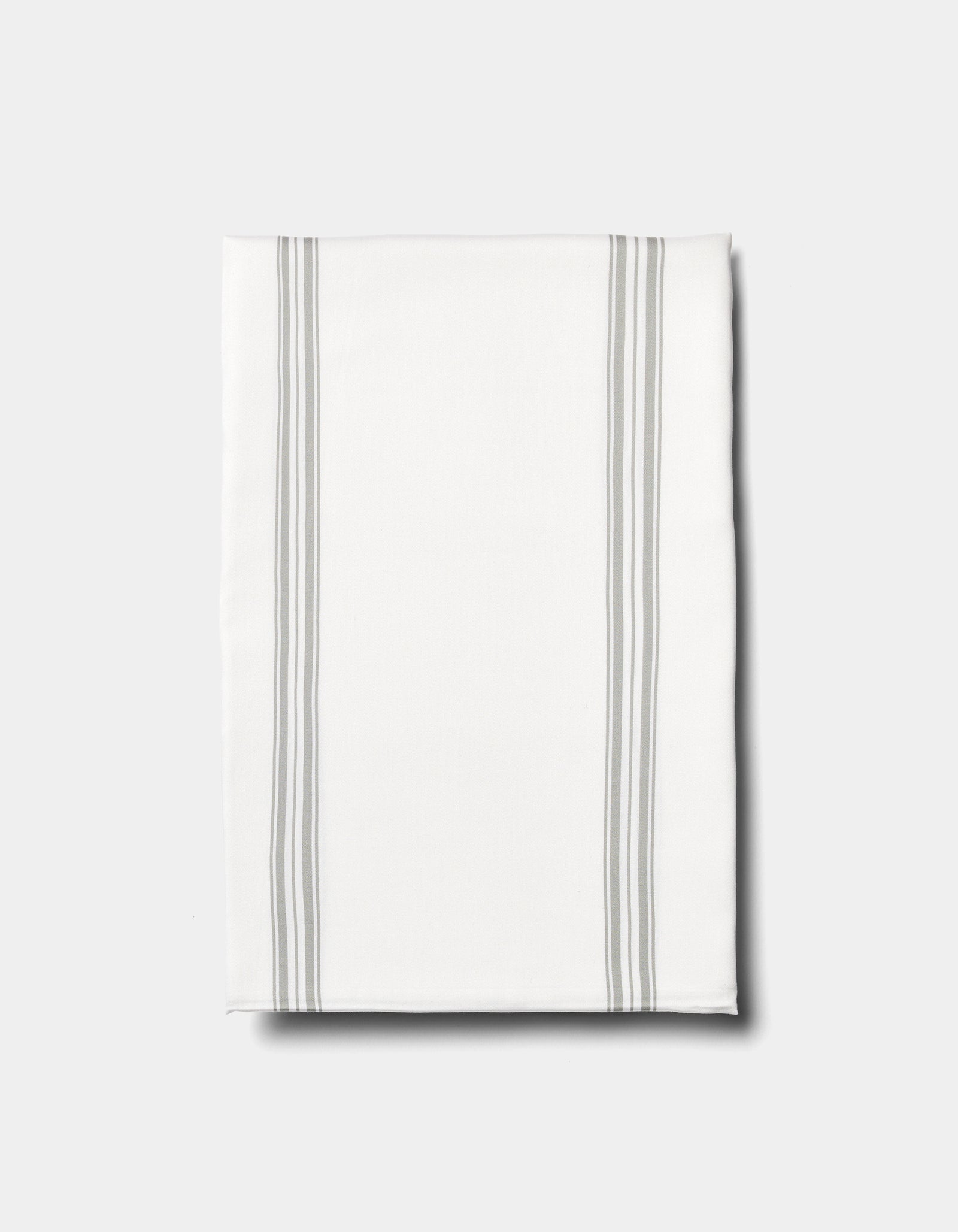 The Cozy Earth Bamboo Sheet Set is displayed on a plain light background, featuring neatly folded white fabric with two pairs of parallel light gray stripes running vertically near the edges.