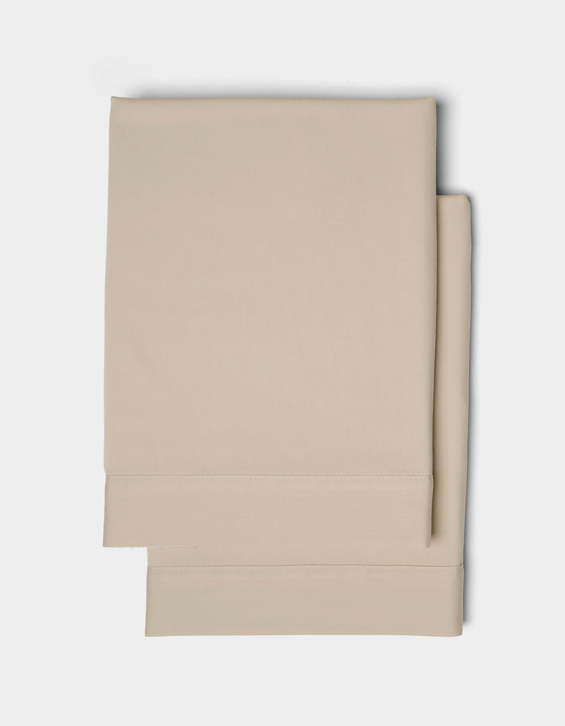 Two neatly folded Cozy Earth Soft-Wash Cotton Shams with stitched hems, displayed on a plain white background.