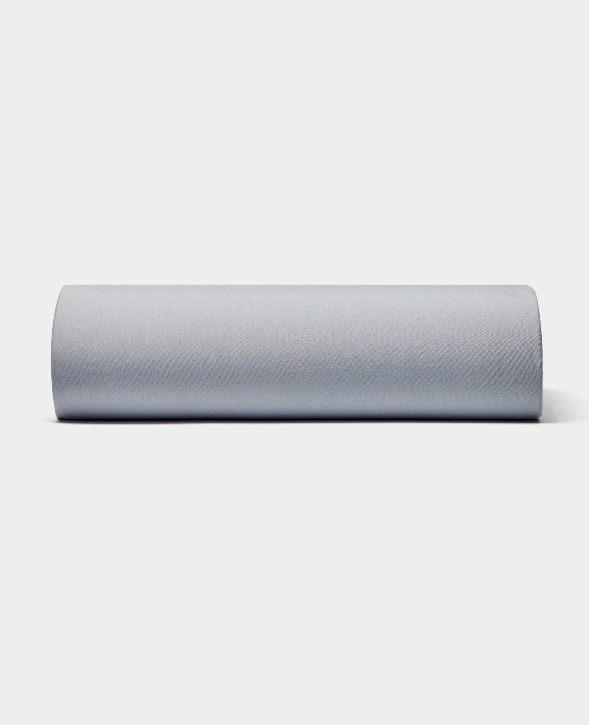 A Bamboo Jersey Fitted Sheet by Cozy Earth is displayed against a plain white background, shown from a front view. |Color:Shore
