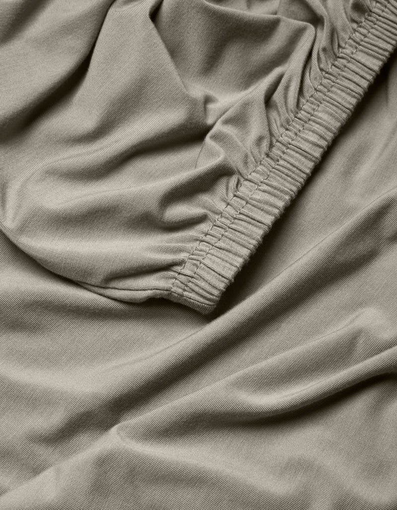 A close-up of the Cozy Earth Bamboo Jersey Fitted Sheet fabric.
