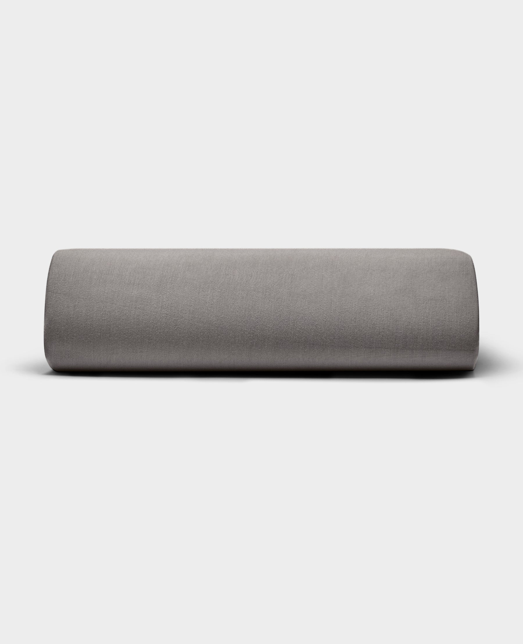 The Bamboo Jersey Fitted Sheet by Cozy Earth is displayed with its smooth gray fabric against a plain white background.
|Color:Stone