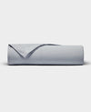 The Cozy Earth Bamboo Jersey Flat Sheet is neatly rolled with a folded edge and displayed on a plain white background.|Color:Shore