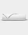The Cozy Earth Bamboo Jersey Flat Sheet is neatly folded with a corner turned back, showcased against a plain light gray background.|Color:White