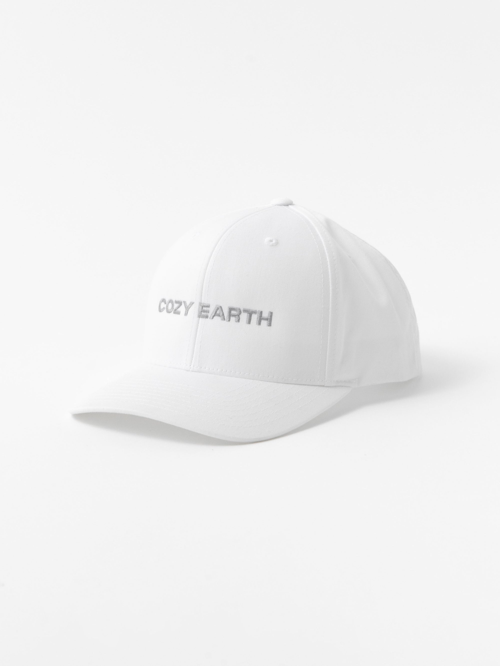 White cap with 'COZY EARTH' text on a white background 