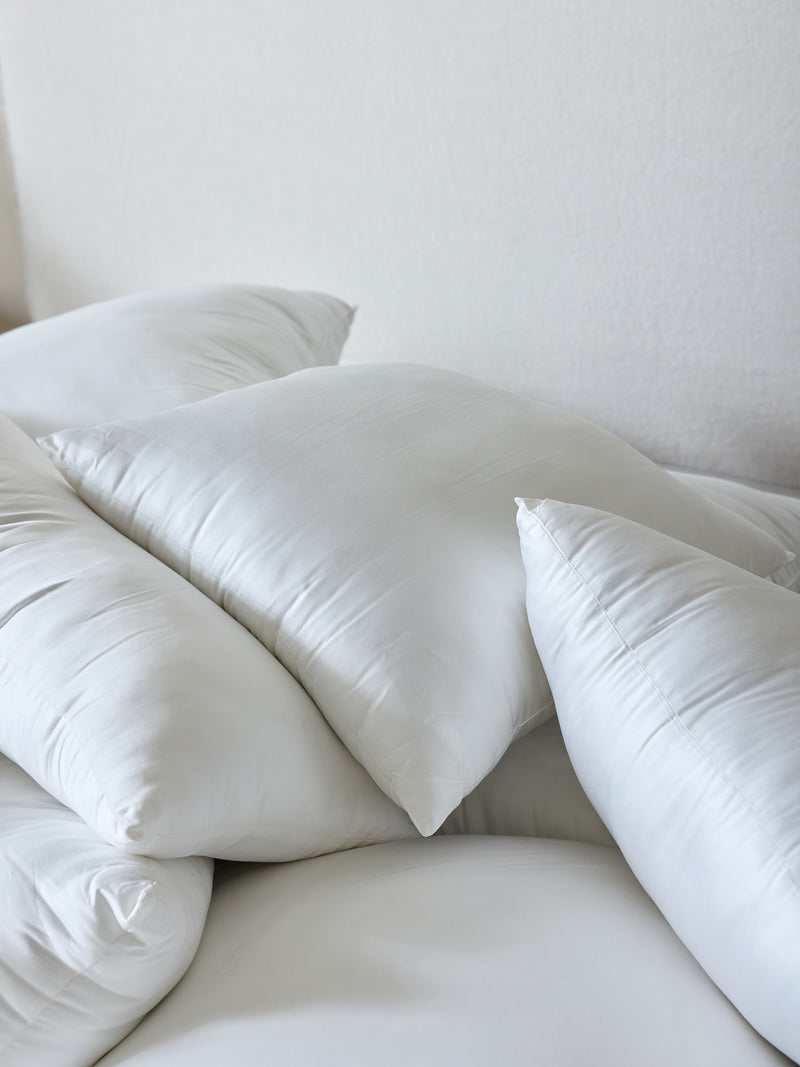 Pile of down alternative inserts