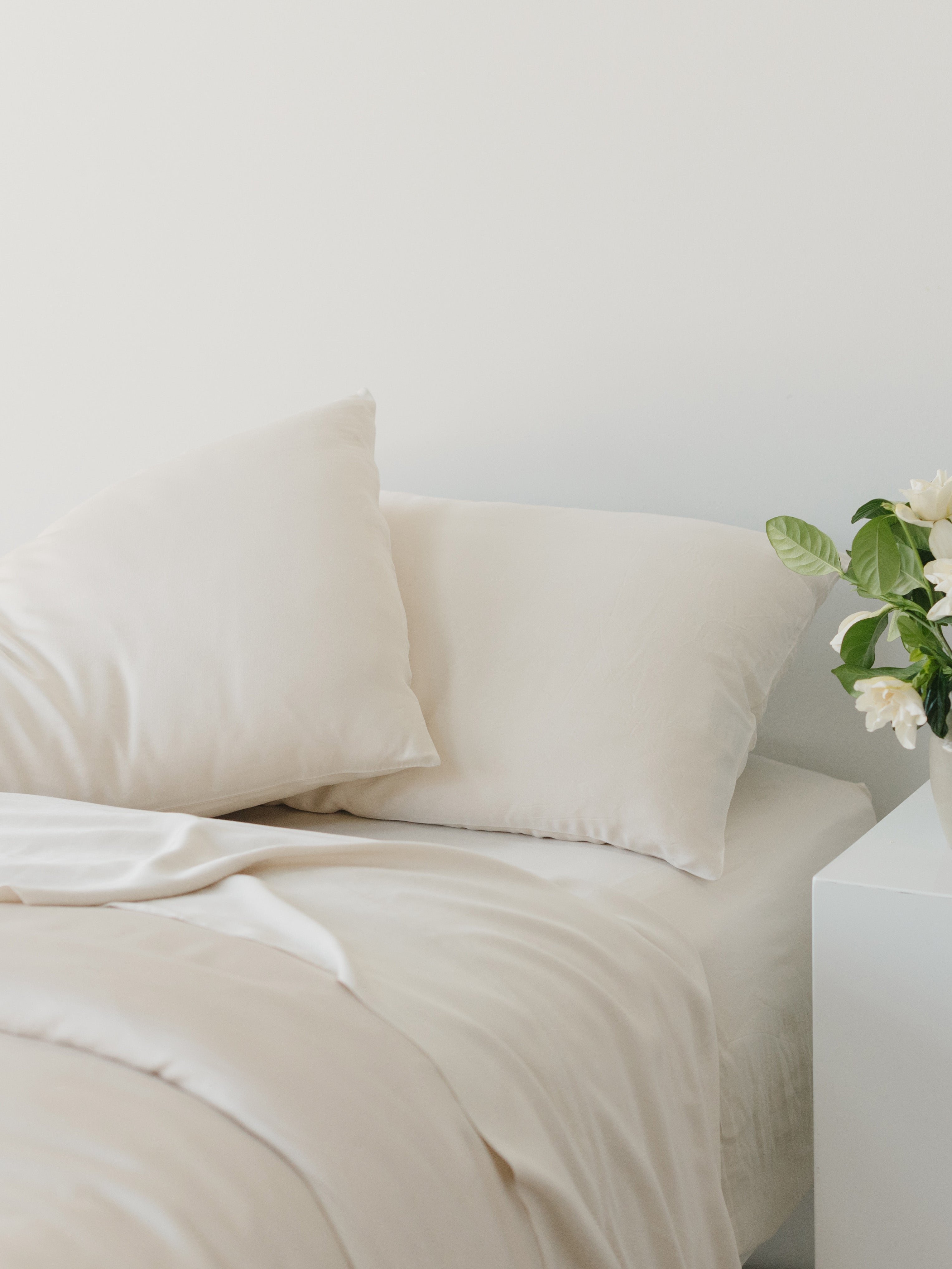 Partially made bed with oat bedding 