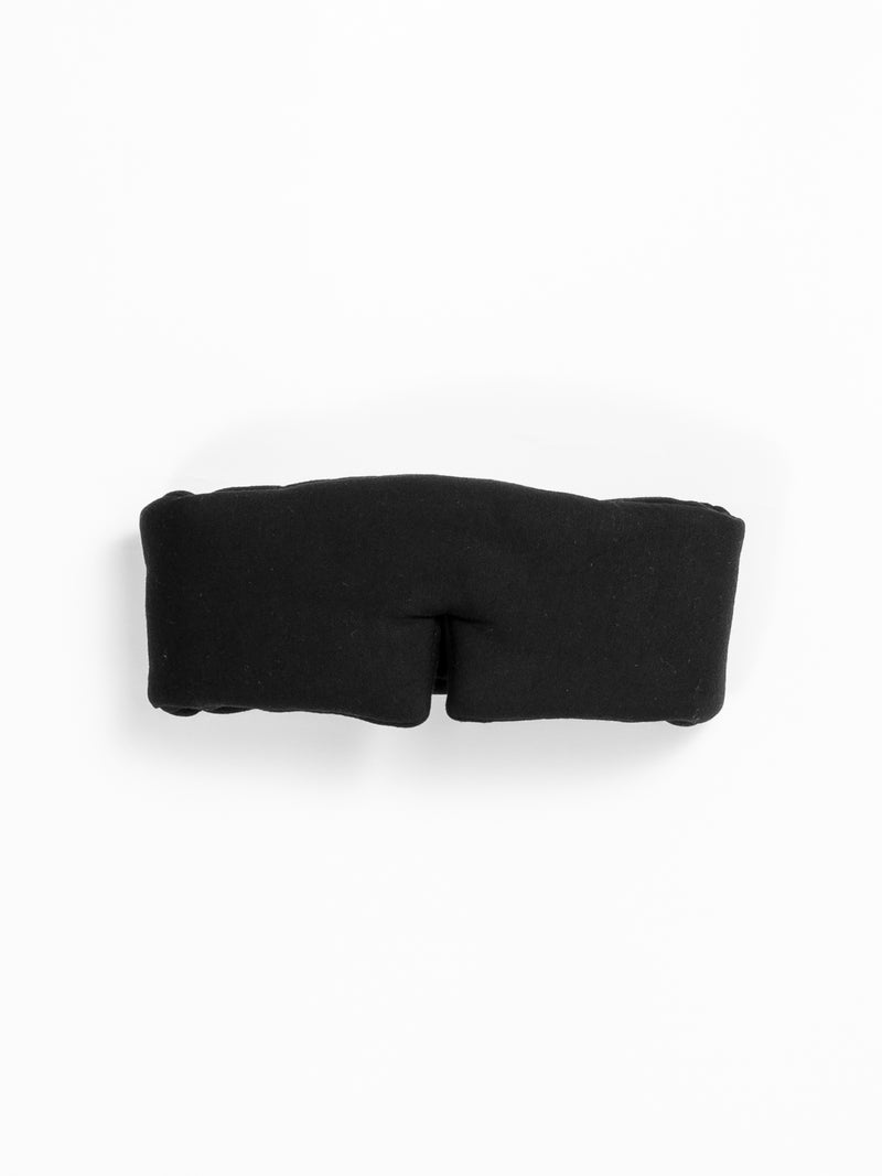 The Cozy Earth Adjustable Bamboo Sleep Mask in Black is pictured on a white background.