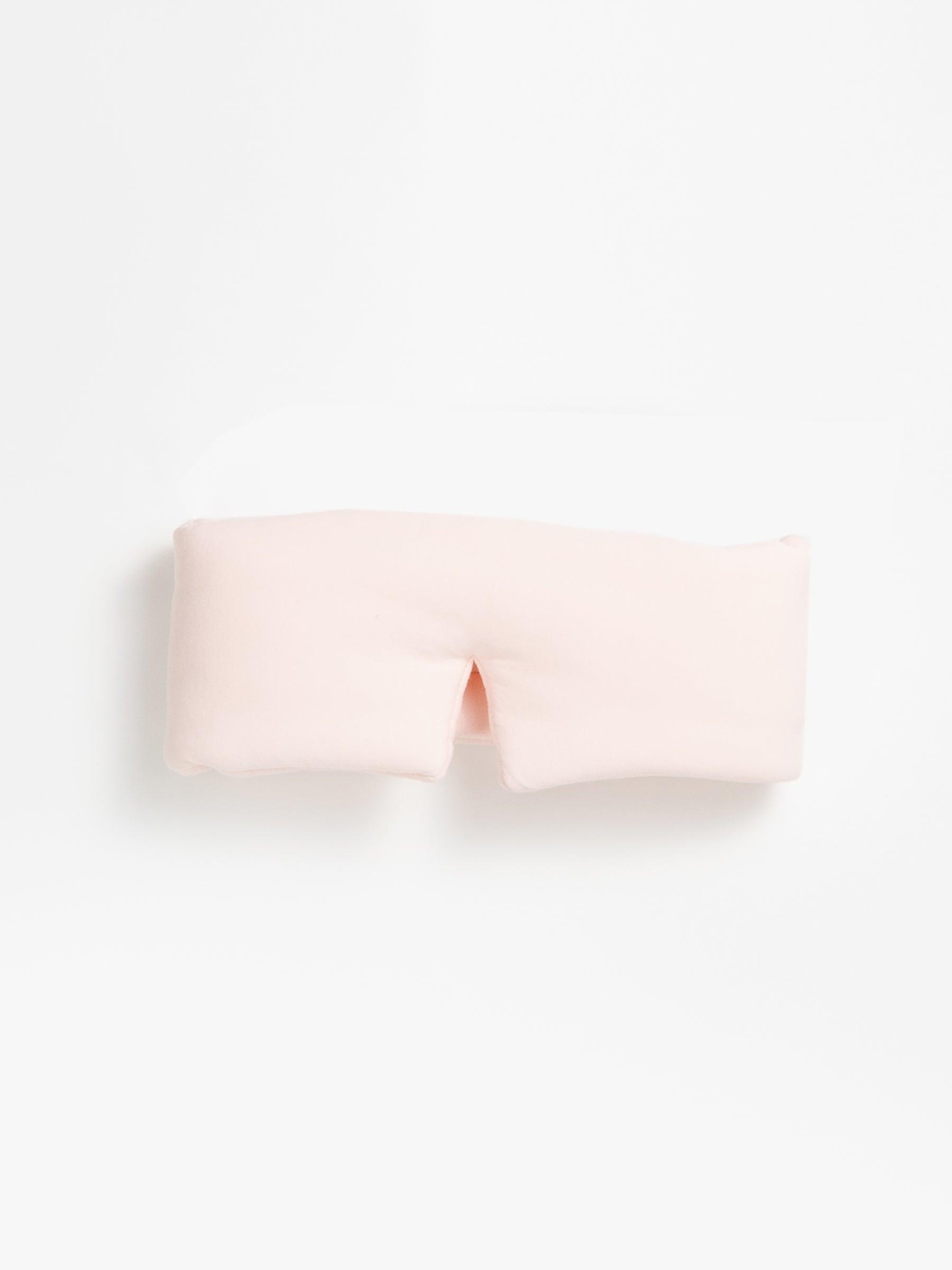 The Cozy Earth Adjustable Bamboo Sleep Mask in Blossom is pictured on a white background. |Color:Blossom