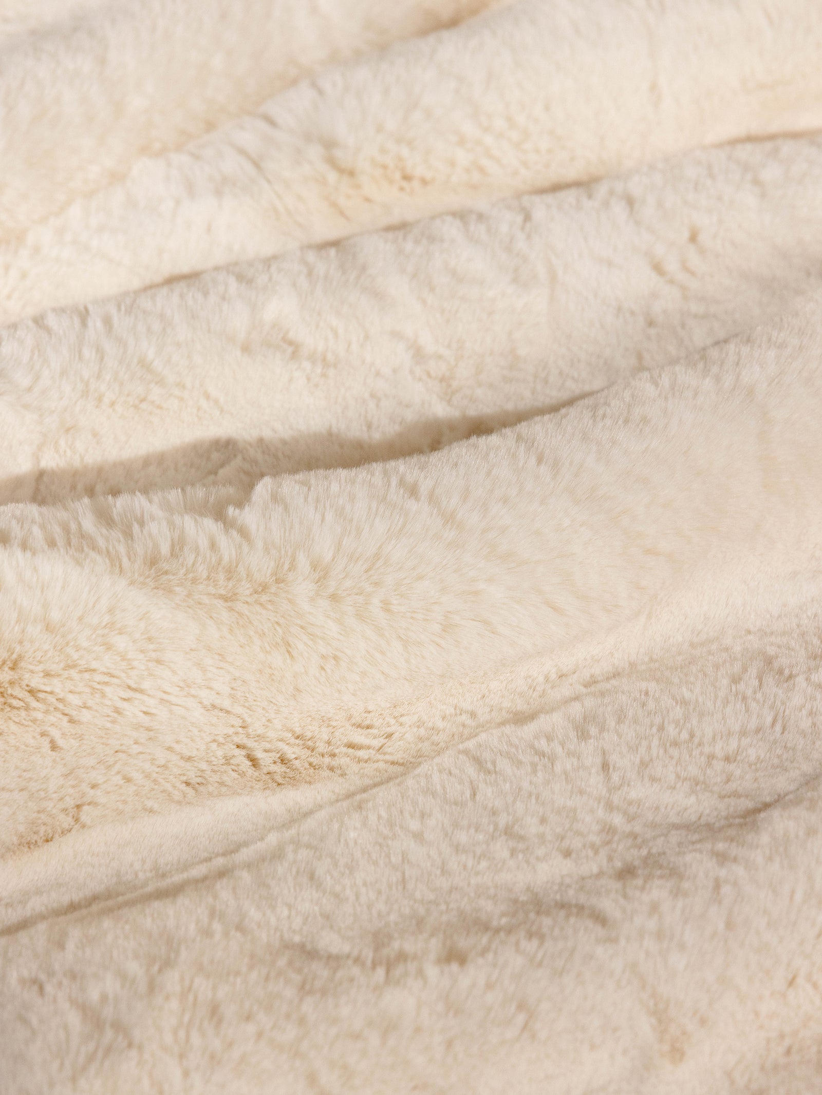 Close up of creme oversized throw cuddle blanket 