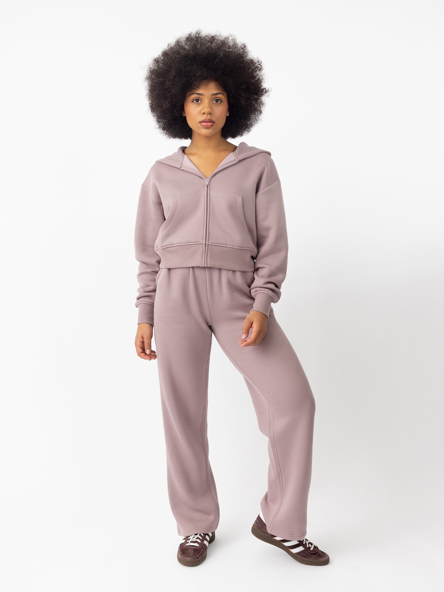 Woman wearing Dusty Orchid CityScape Wide Leg Pant with white background 