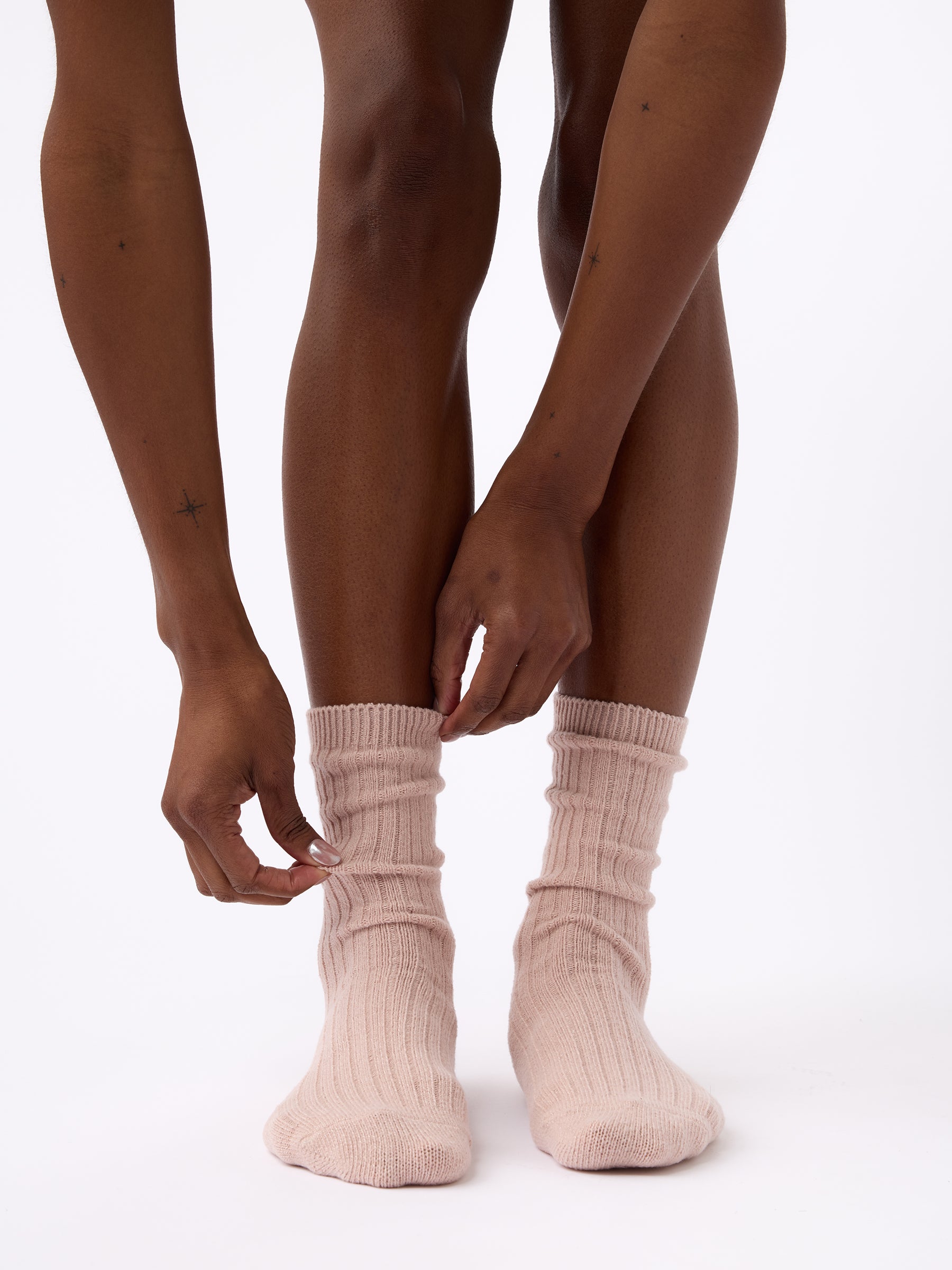 Person wearing Cozy Earth Plush Lounge Calf Sock 1-Pack in Dusty Rose 